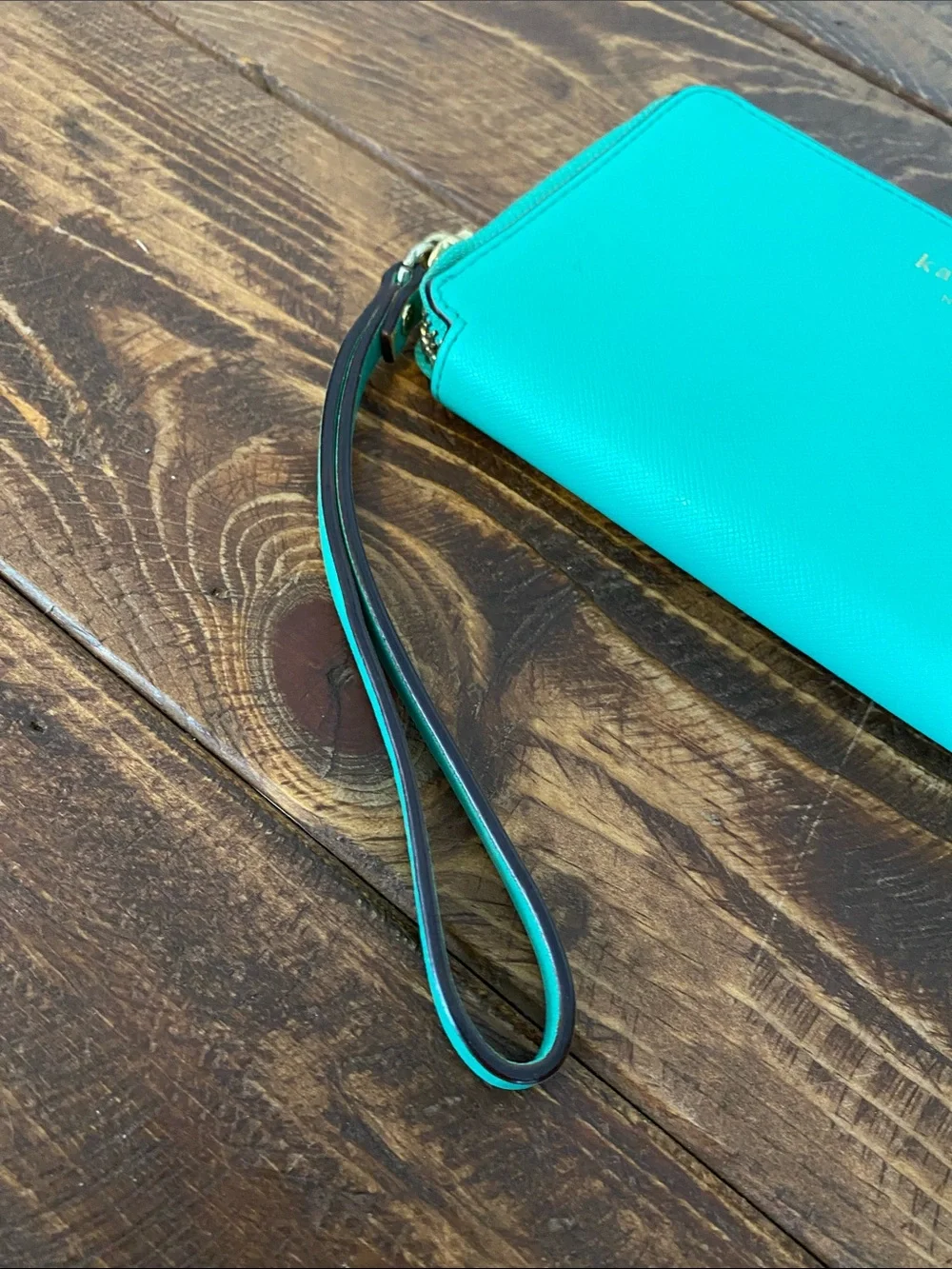 kate spade teal zip-around wristlet with strap